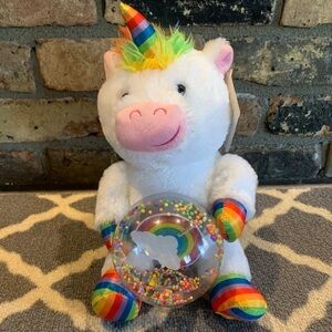 Singing and dancing unicorn rainbow plush toy